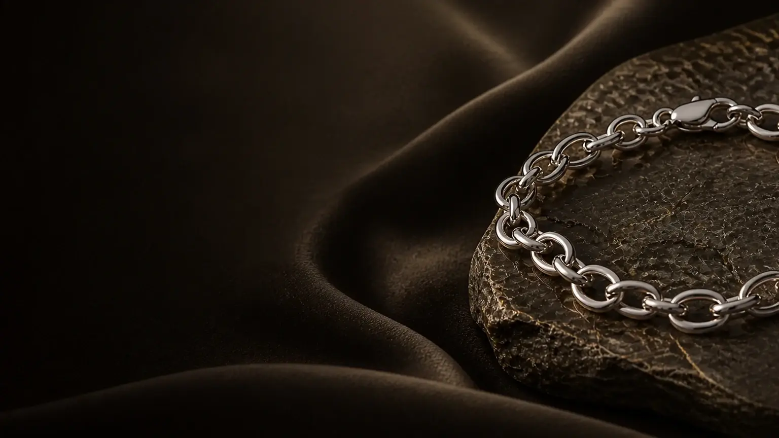 Rose-gold sculpted ring on plum stone