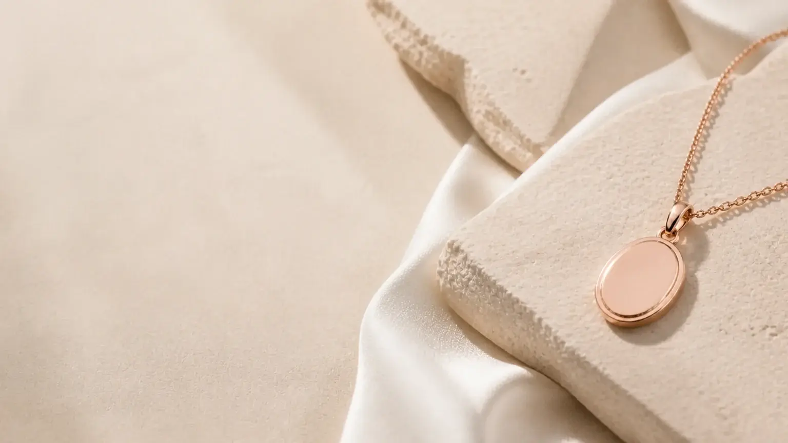 Rose-gold oval pendant on blush stone
